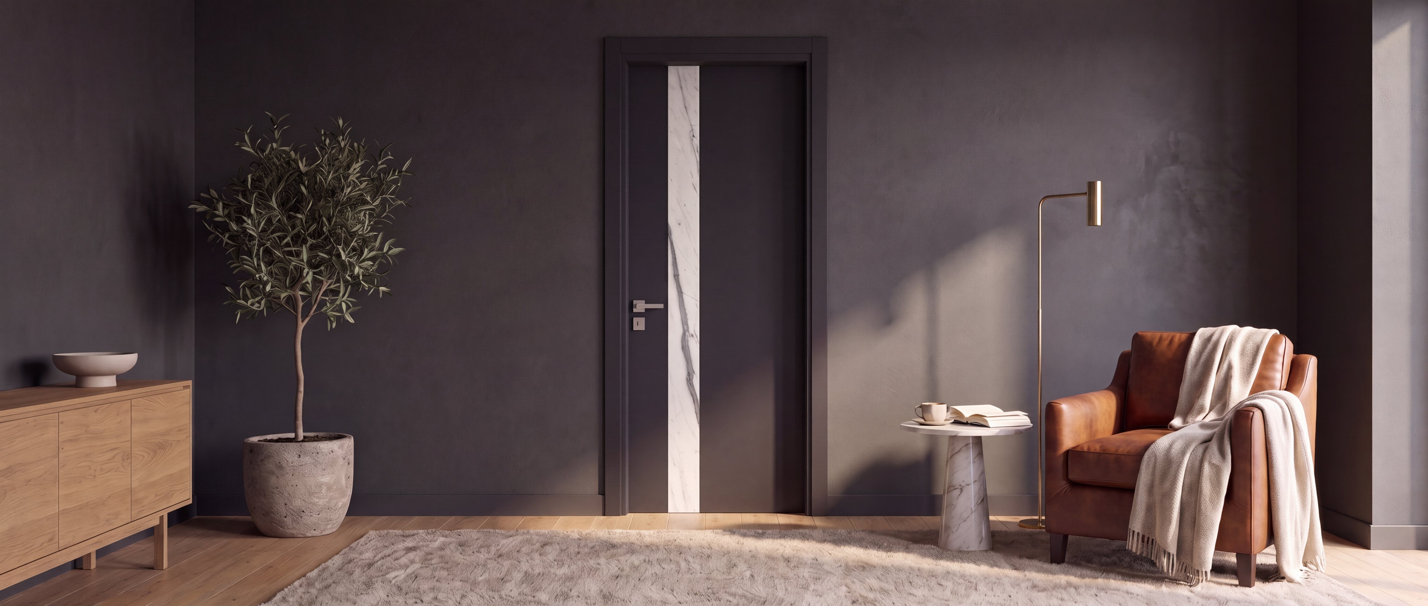 Porta nera con la fascia in marmo, in un salotto con le pareti antracite